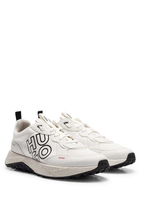 TENIS DE DIFERENTES MATERIALES CON LOGO HOMBRE