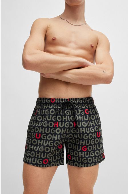 PANTALONETAS DE BAÑO TIPO SHORTS CON LOGO ESTAMPADO HOMBRE