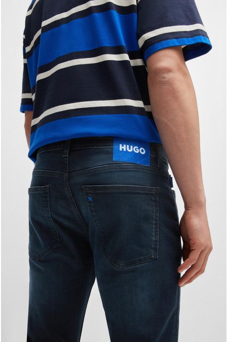 JEANS EXTRA-SLIM FIT DE DENIM ELÁSTICO HOMBRE