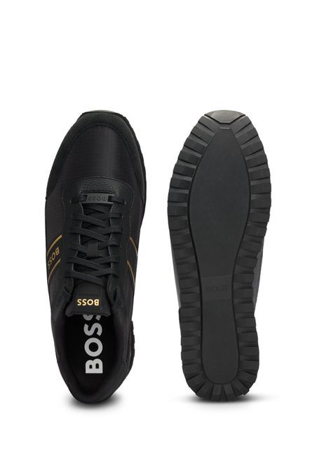 TENIS EN MEZCLA DE MATERIALES CON CORDONES Y RIBETES LATERALES HOMBRE