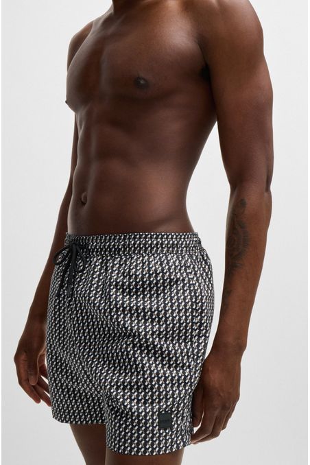 PANTALONETAS DE BAÑO CON CORDÓN EN LA CINTURA Y ESTAMPADO HOMBRE