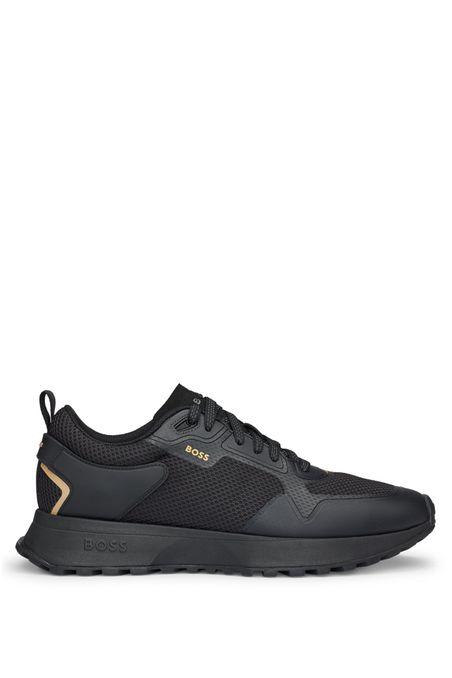 TENIS DE MEZCLA DE MATERIALES CON DETALLES DE MALLA Y DE LA MARCA HOMBRE