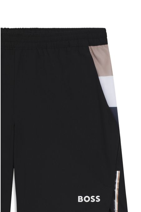 SHORTS DEPORTIVOS DE TENIS EN TEJIDO ELÁSTICO CON CONTROL DE LA HUMEDAD SHORTS REGULAR FIT HOMBRE