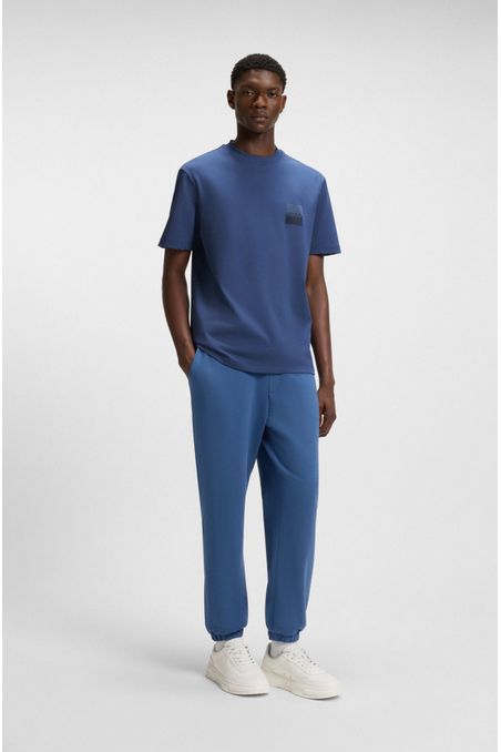 CAMISETA RELAXED FIT DE ALGODÓN CON LOGOS EN DOS PARTES PLAYERA RELAXED FIT HOMBRE