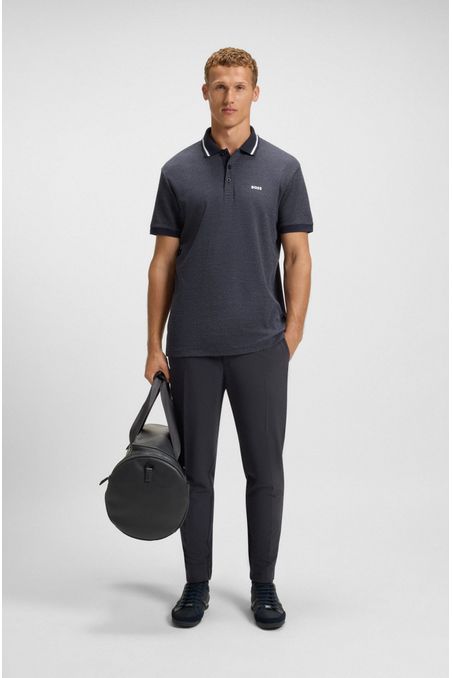 PANTALONES TAPERED FIT DE TEJIDO ELÁSTICO REPELENTE AL AGUA PANTALONES CASUALES TAPERED FIT HOMBRE