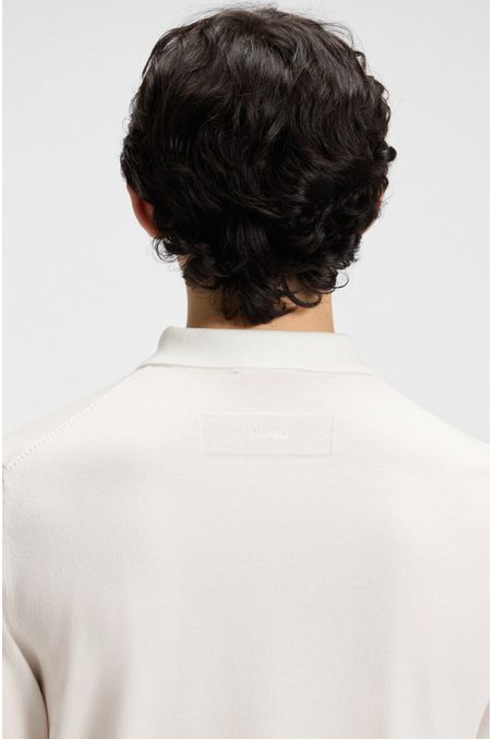 POLO DE PUNTO CON TAPETA OCULTA SUETÉR REGULAR FIT HOMBRE