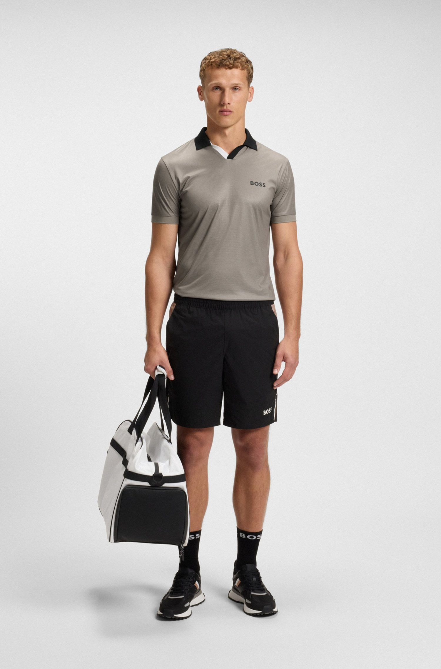 POLO SLIM FIT DEPORTIVO EN TEJIDO ANTIDESGARROS CON BLOQUES DE COLOR POLO SLIM FIT HOMBRE